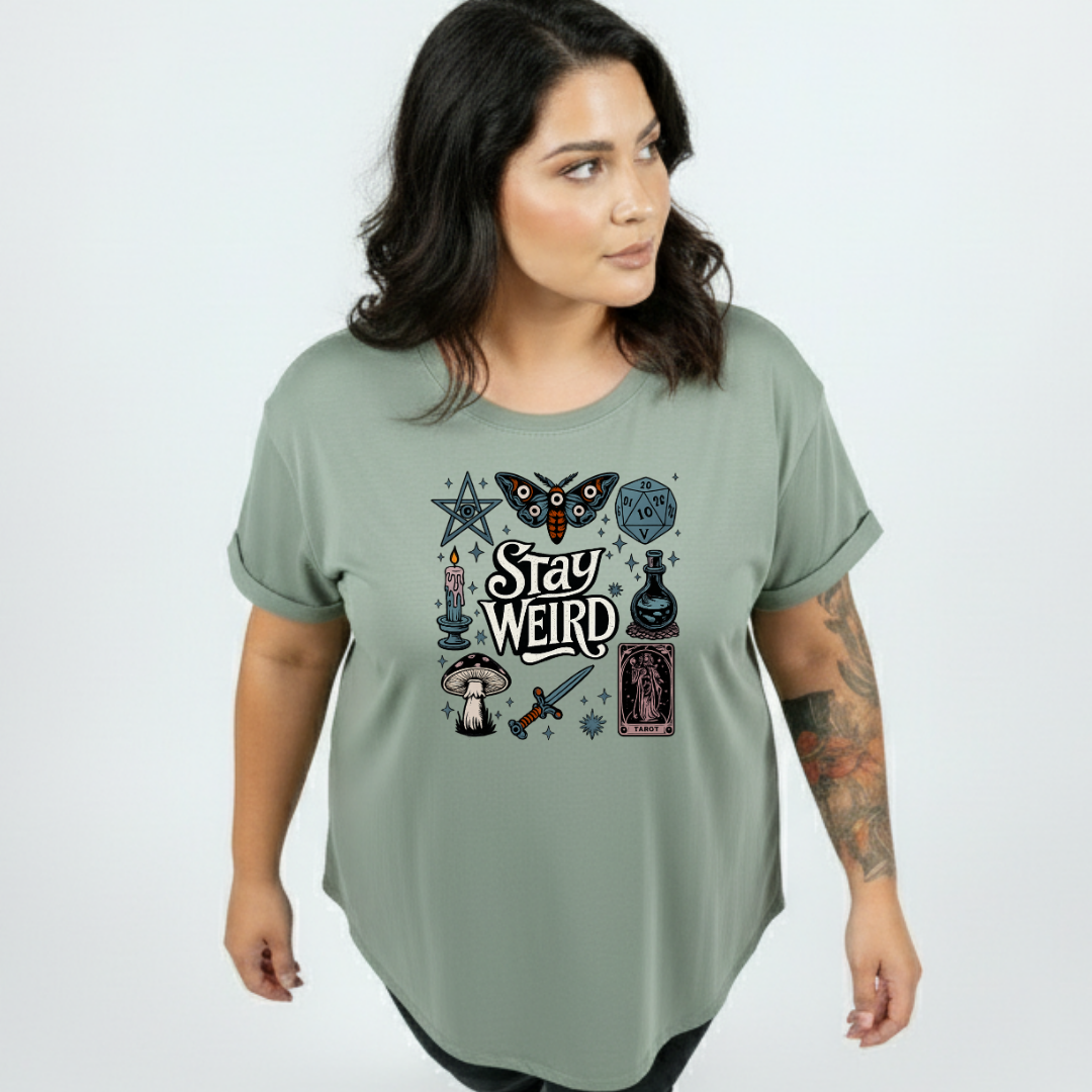 Front view of woman wearing slate green Stay Weird oversized tee, relaxed drop shoulder fit, plus size Australian streetwear by Bae Bands
