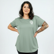 Front view of woman wearing slate green My Tattoos Don't Like You Either oversized tee, relaxed drop shoulder fit, plus size Australian streetwear by Bae Bands