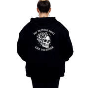 Back view of black My Tattoos Don't Like You Either hoodie showing full skull and rose DTF print with arched text detail, relaxed plus size fit, Bae Bands Australia