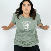 Front view of woman wearing teal My Tattoos Don't Like You Either oversized tee, relaxed drop shoulder fit, plus size Australian made streetwear by Bae Bands
