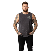 Front view of a man wearing black stonewashed Stay Weird tank top, relaxed fit, plus size Australian streetwear by Bae Bands