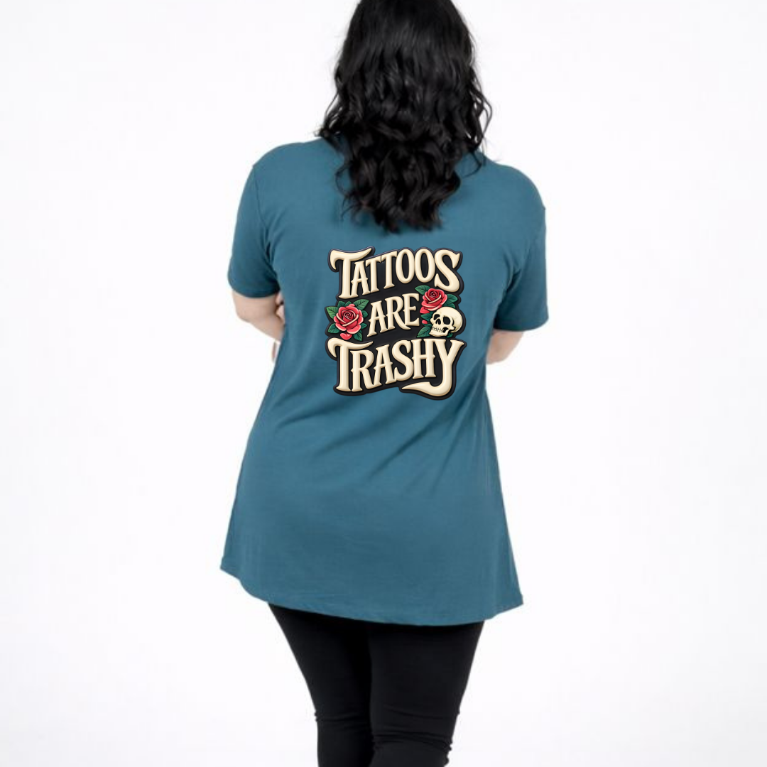 Person wearing a teal t-shirt with 'Tattoos Are Trashy' text on the back.