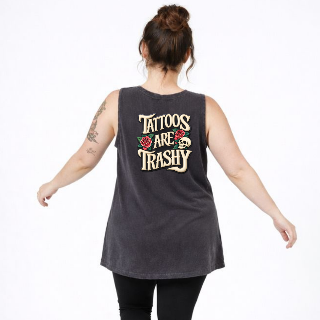 Person wearing a sleeveless shirt with 'Tattoos Are Trashy' text on the back.
