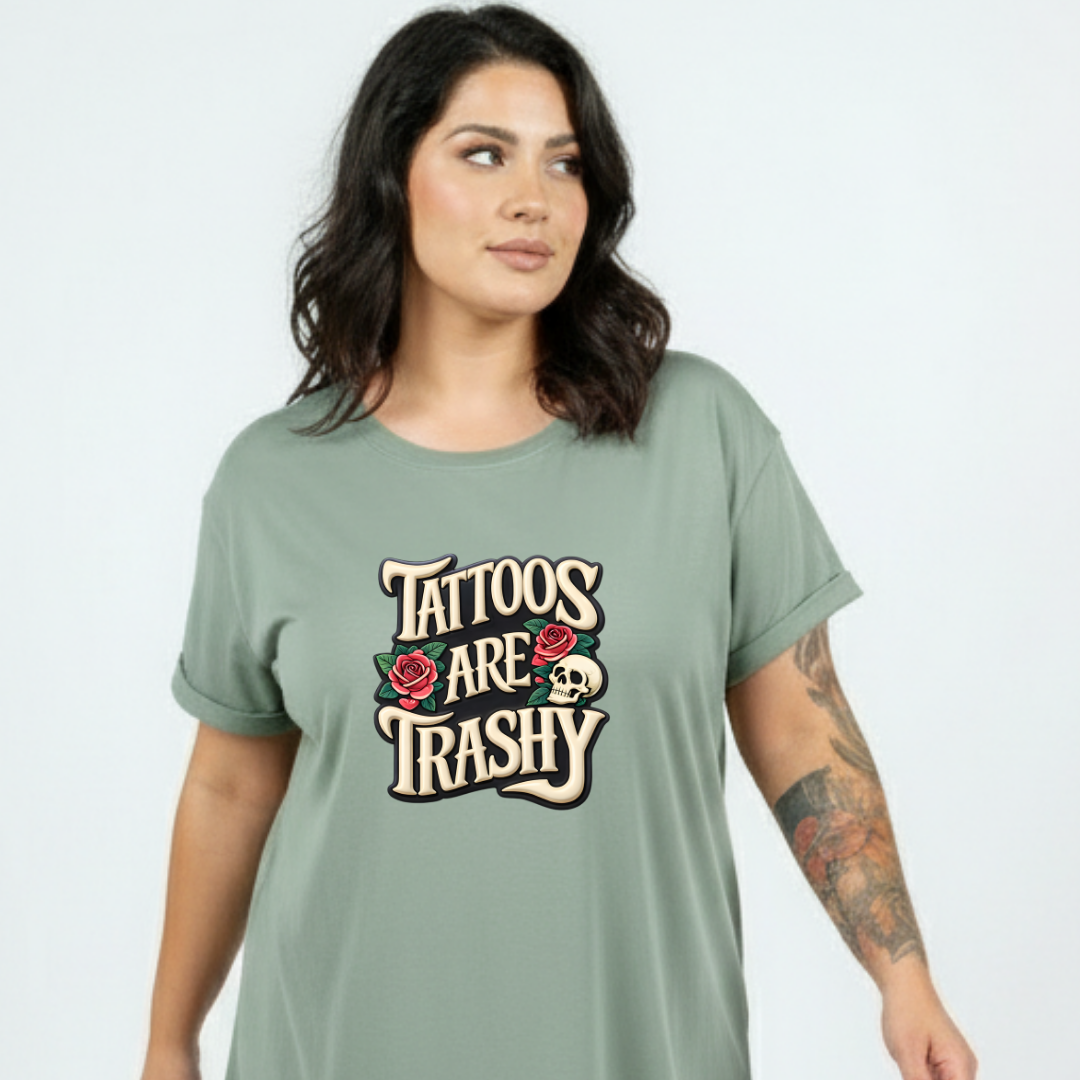 Woman wearing a green t-shirt with 'Tattoos Are Trashy' text and graphics.