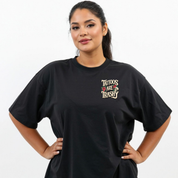 Person wearing a black t-shirt with 'Tattoos Are Trashy' text on a white background