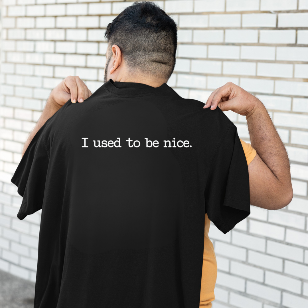 Man wearing black oversized relaxed fit tee, plus size Australian streetwear by Bae Bands