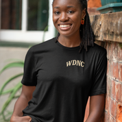 Melbourne-made plus-size black tee showcasing a gothic skull, barbed-wire, crossed wooden bats and rose details under “We Do Not Care Club”