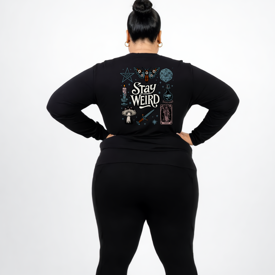 Back view of black Stay Weird long sleeve tee showing full witchy illustrated grid with moth, mushrooms, tarot card and candle DTF print detail, relaxed plus size fit, Bae Bands Australia