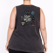 Woman wearing black stonewashed tank top with Stay Weird witchy illustration back print, plus size Australian streetwear by Bae Bands
