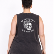 Woman wearing black stonewashed tank top with My Tattoos Don't Like You Either skull and rose back print, plus size Australian streetwear by Bae Bands