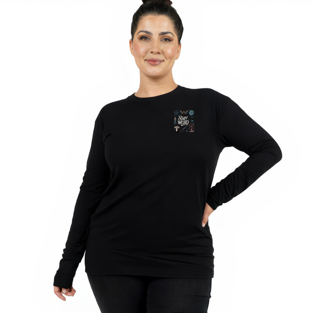 Woman wearing black long sleeve graphic tee with Stay Weird witchy illustration back print, plus size Australian streetwear by Bae Bands