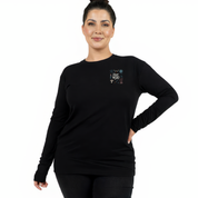 Woman wearing black long sleeve graphic tee with Stay Weird witchy illustration back print, plus size Australian streetwear by Bae Bands