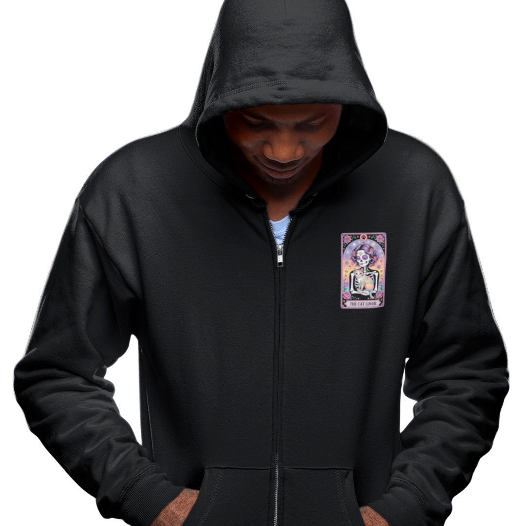 Person wearing a black hoodie with a colorful patch on the chest against a white background