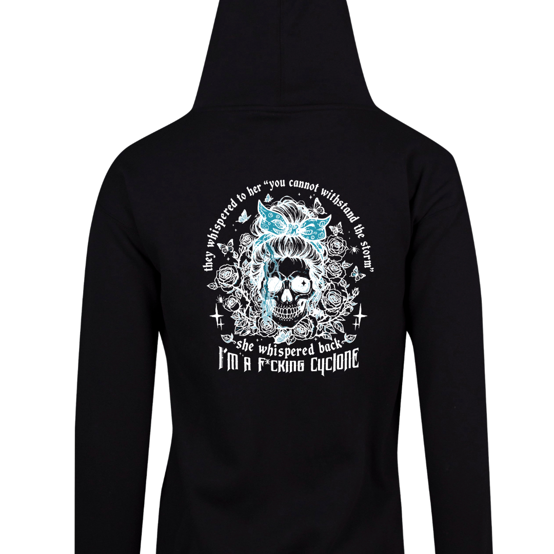 Black zip up hoodie with a bandana skull back print reading she whispered back I'm a f*cking cyclone