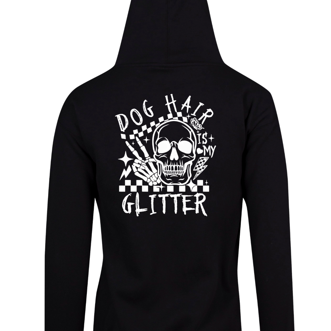 Black zip up hoodie back print of a skull with a skeleton hand reading Dog Hair Is My Glitter