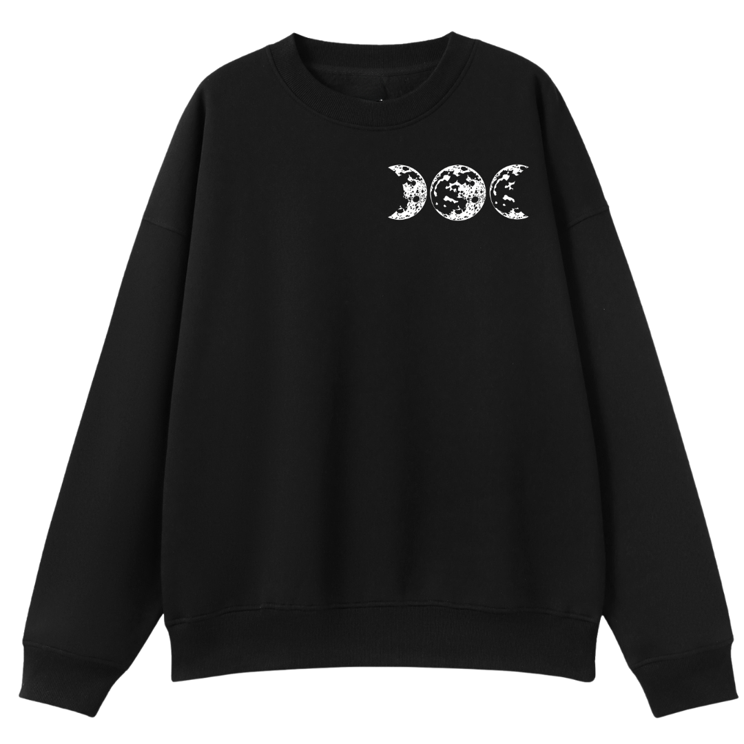 A black oversized crew neck with a small Support Your Local Coven graphic on the left chest.