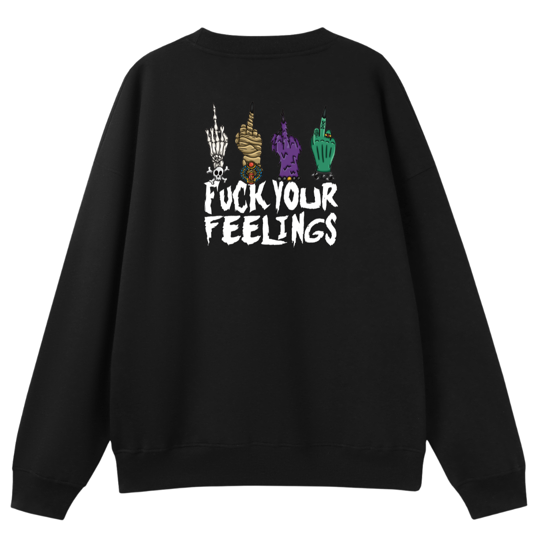 A black oversized crew neck shown from the back, with the Fuck Your Feelings graphic printed large across the back, skeleton, mummy, werewolf and witch hands flipping the bird.