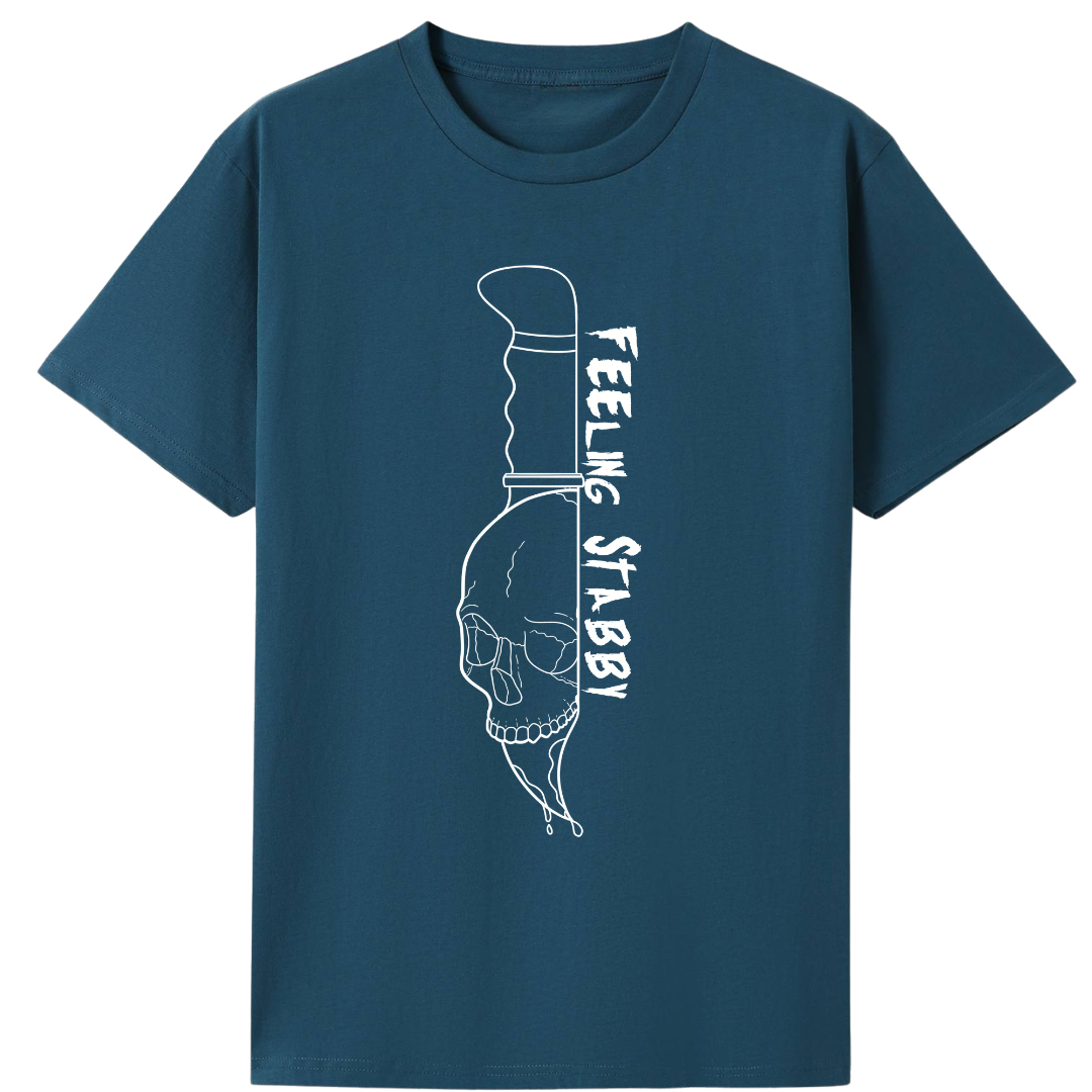 A teal oversized tee with the Feeling Stabby graphic printed large on the front, a line drawn skull on a knife blade.