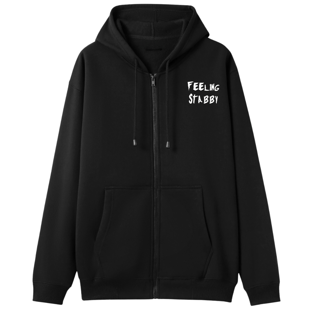 A black oversized zip up hoodie with a small Feeling Stabby graphic on the left chest.
