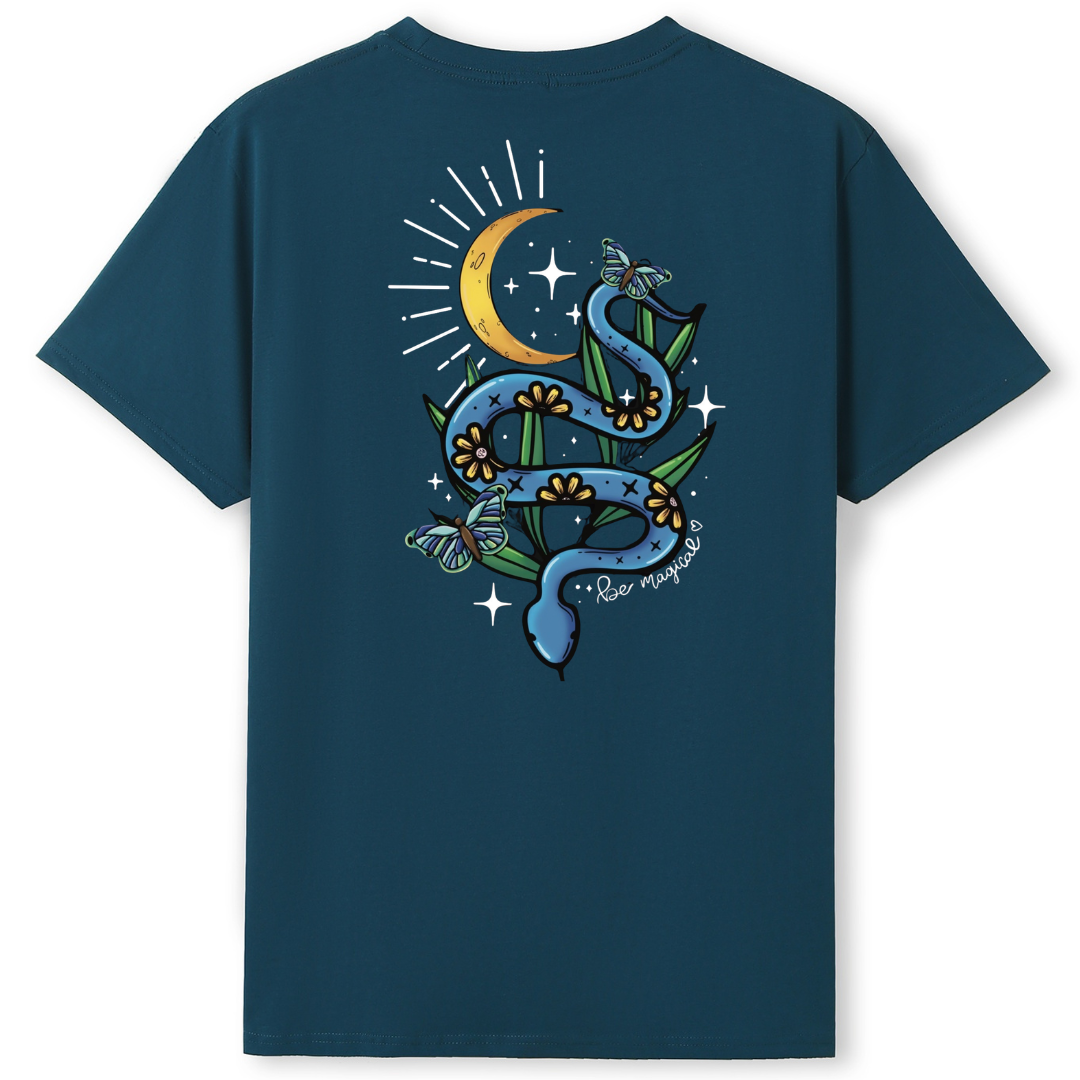 A teal oversized tee shown from the back, with the Be Magic snake graphic printed large across the back, a blue floral snake with butterflies under a crescent moon.