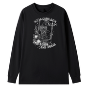 A black long sleeve tee with the We'll Come Back Again graphic printed large on the front, a crow on a tarot card framed by flowers.