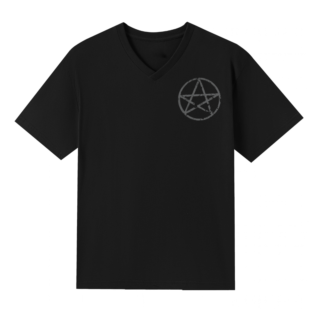 A black V neck oversized tee with a small Village Witch graphic on the left chest.