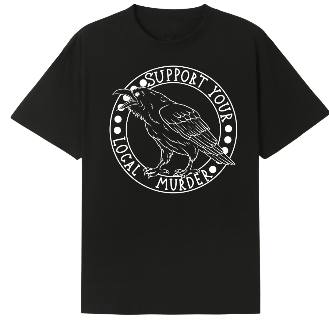 A black oversized tee with the Support Your Local Murder graphic printed large on the front, a crow inside a circular badge.
