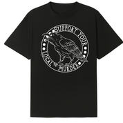 A black oversized tee with the Support Your Local Murder graphic printed large on the front, a crow inside a circular badge.