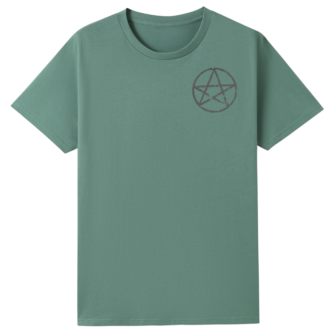 A slate green oversized tee with a small Village Witch graphic on the left chest.