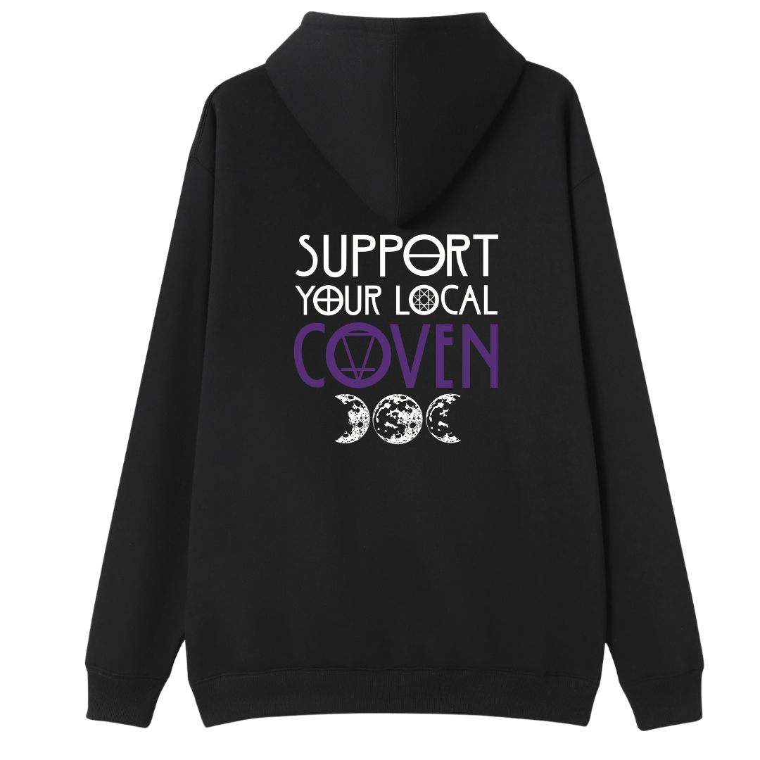 A black oversized zip up hoodie shown from the back, with the Support Your Local Coven graphic printed large across the back, purple lettering above a triple moon.