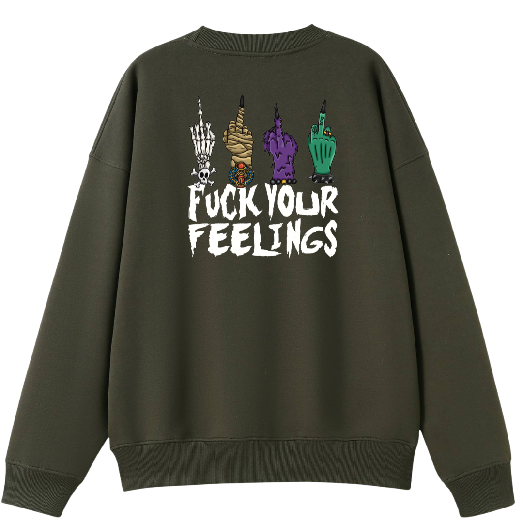 An army green oversized crew neck shown from the back, with the Fuck Your Feelings graphic printed large across the back, skeleton, mummy, werewolf and witch hands flipping the bird.