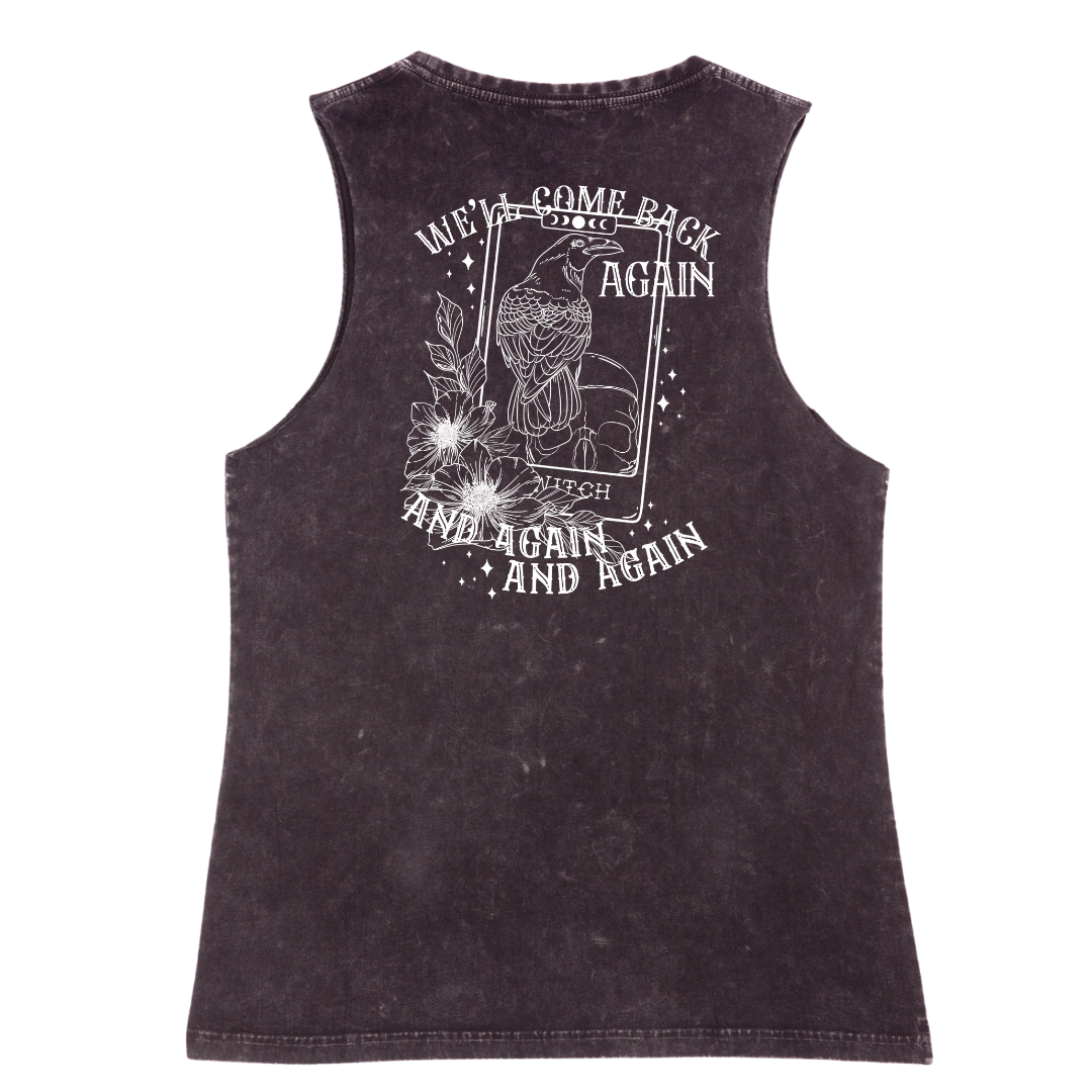 A black stone washed tank shown from the back, with the We'll Come Back Again graphic printed large across the back, a crow on a tarot card framed by flowers.