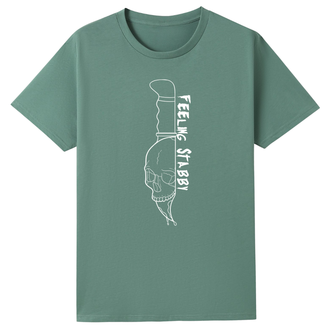 A slate green oversized tee with the Feeling Stabby graphic printed large on the front, a line drawn skull on a knife blade.
