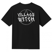 A black V neck oversized tee shown from the back, with the Village Witch graphic printed large across the back, scratchy lettering over a weathered pentagram.