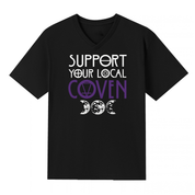 A black V neck oversized tee with the Support Your Local Coven graphic printed large on the front, purple lettering above a triple moon.