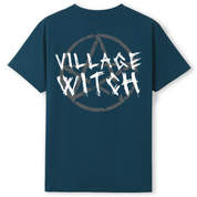 A teal oversized tee shown from the back, with the Village Witch graphic printed large across the back, scratchy lettering over a weathered pentagram.
