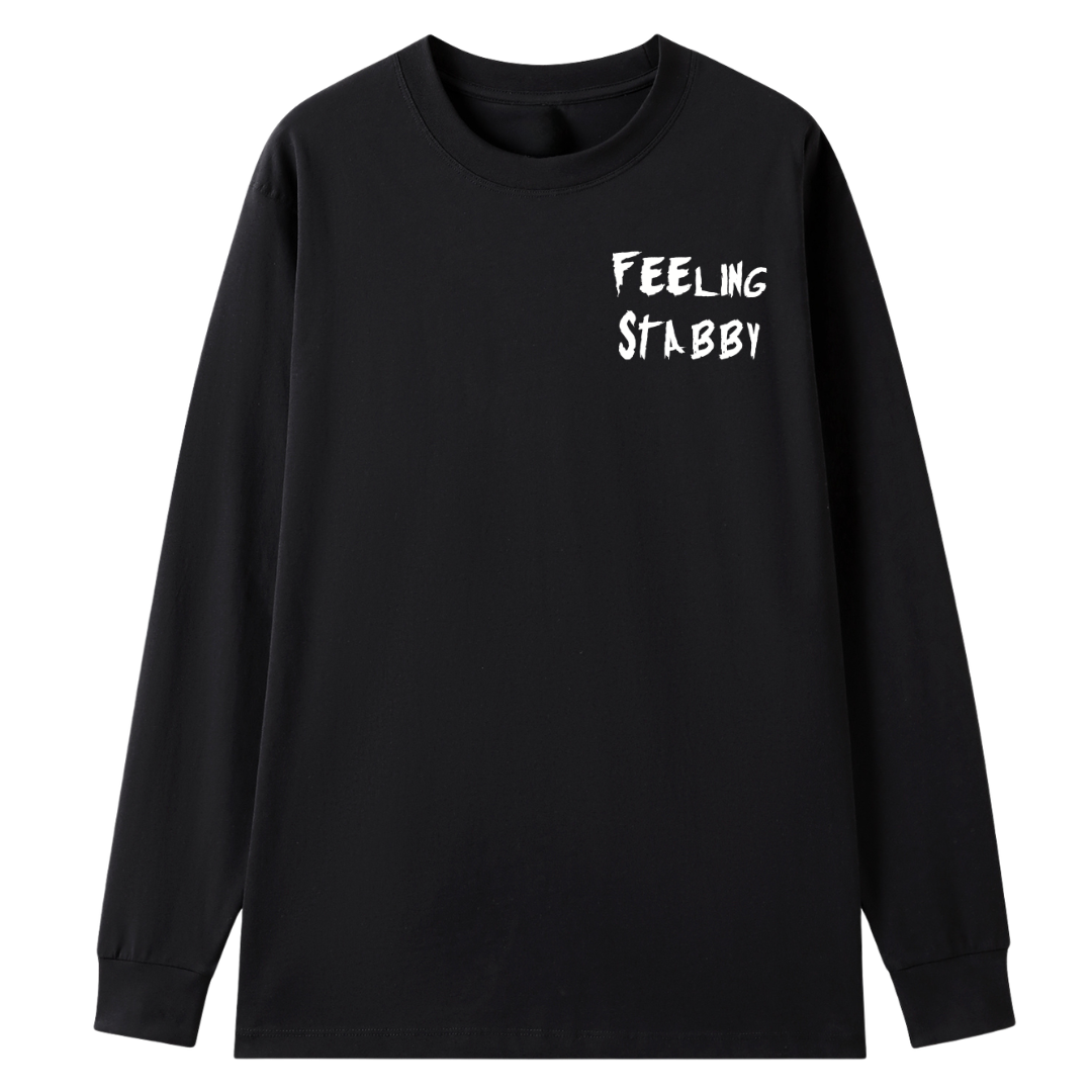 A black long sleeve tee with a small Feeling Stabby graphic on the left chest.