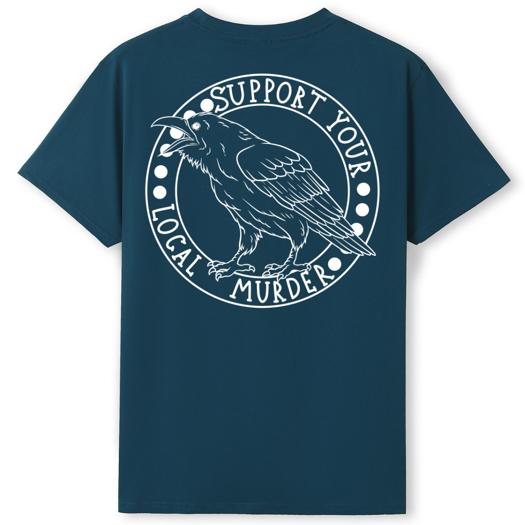 A teal oversized tee shown from the back, with the Support Your Local Murder graphic printed large across the back, a crow inside a circular badge.