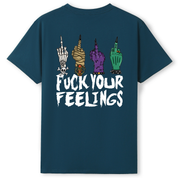 A teal oversized tee shown from the back, with the Fuck Your Feelings graphic printed large across the back, skeleton, mummy, werewolf and witch hands flipping the bird.