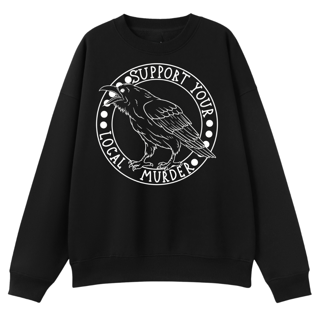 A black oversized crew neck with the Support Your Local Murder graphic printed large on the front, a crow inside a circular badge.