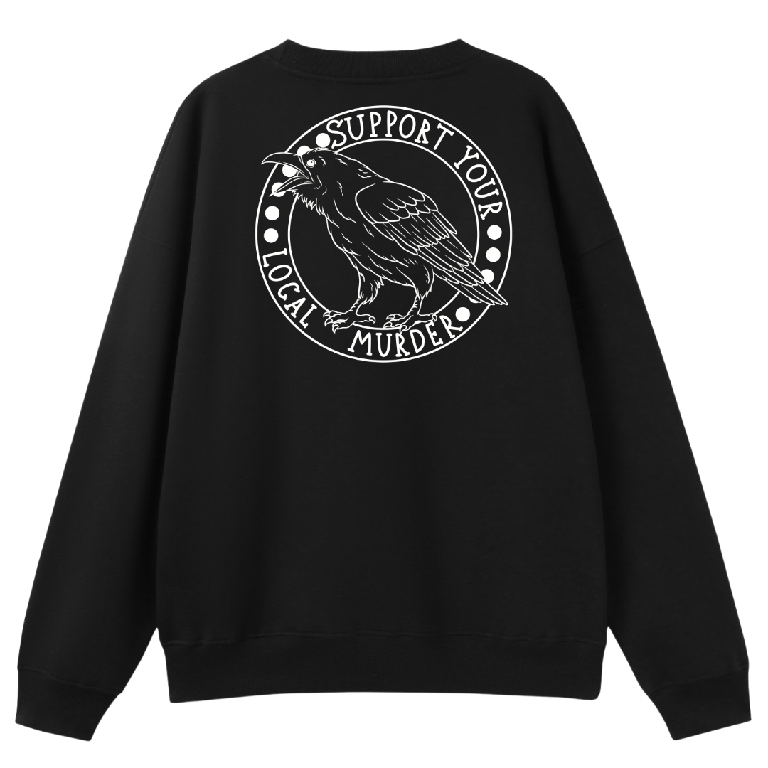 A black oversized crew neck shown from the back, with the Support Your Local Murder graphic printed large across the back, a crow inside a circular badge.