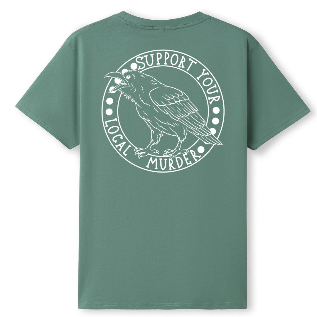A slate green oversized tee shown from the back, with the Support Your Local Murder graphic printed large across the back, a crow inside a circular badge.