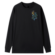 A black long sleeve tee with a small Be Magic snake graphic on the left chest.