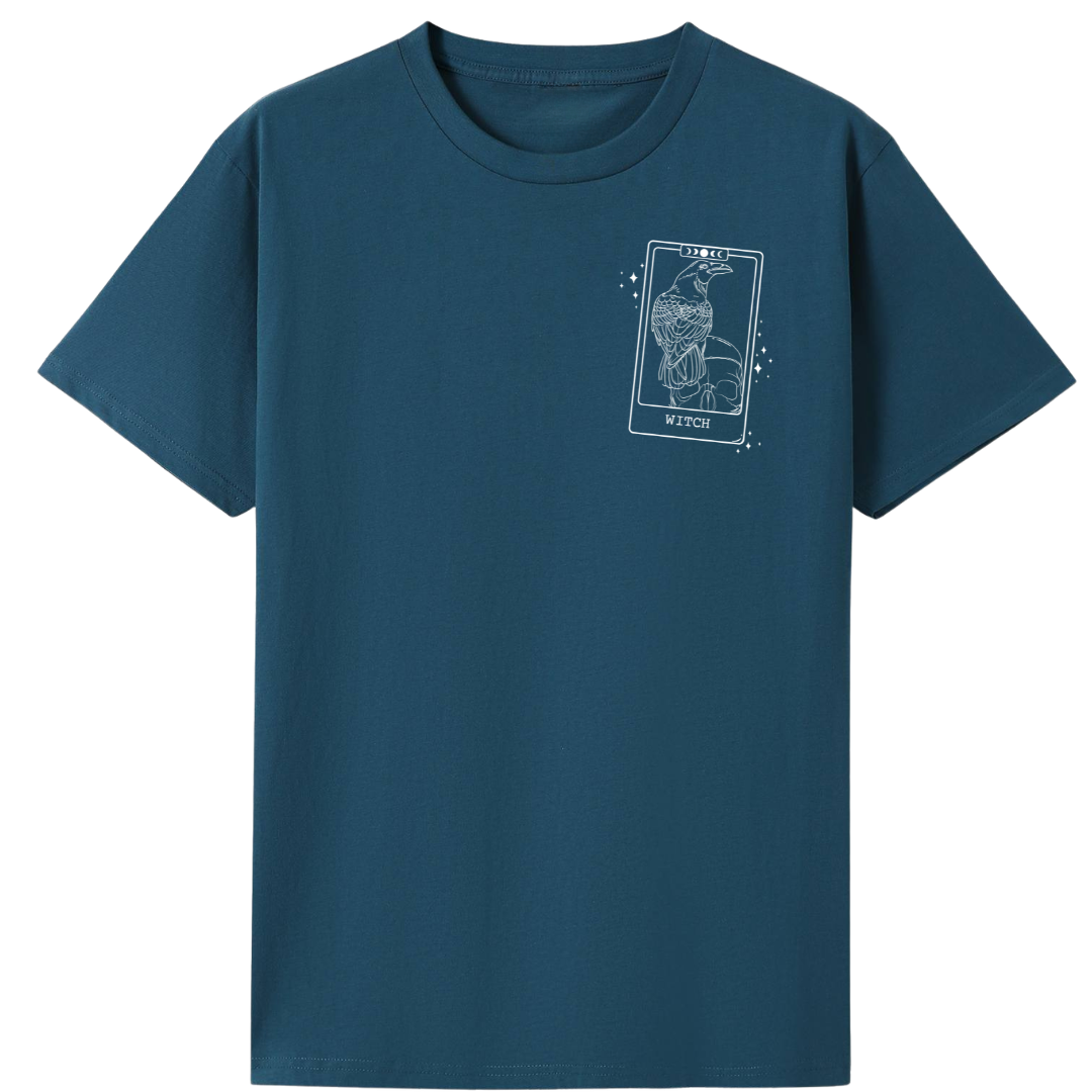 A teal oversized tee with a small We'll Come Back Again graphic on the left chest.