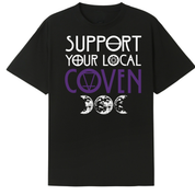 A black oversized tee with the Support Your Local Coven graphic printed large on the front, purple lettering above a triple moon.
