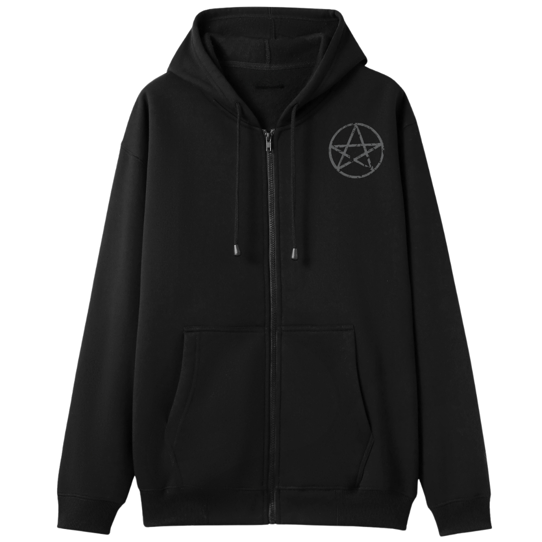 A black oversized zip up hoodie with a small Village Witch graphic on the left chest.