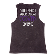 A black stone washed tank shown from the back, with the Support Your Local Coven graphic printed large across the back, purple lettering above a triple moon.