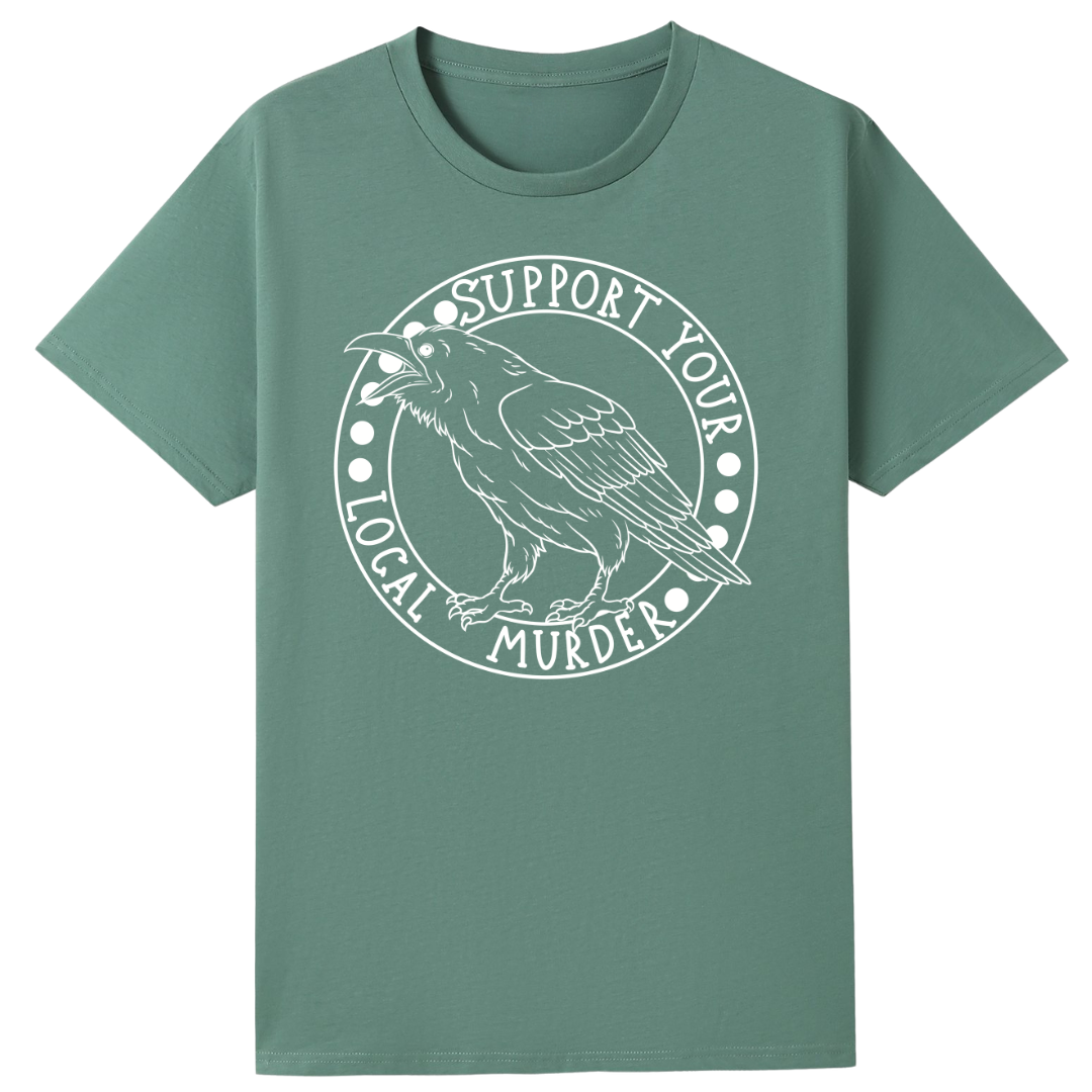A slate green oversized tee with the Support Your Local Murder graphic printed large on the front, a crow inside a circular badge.