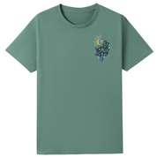 A slate green oversized tee with a small Be Magic snake graphic on the left chest.
