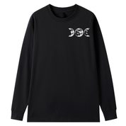 A black long sleeve tee with a small Support Your Local Coven graphic on the left chest.